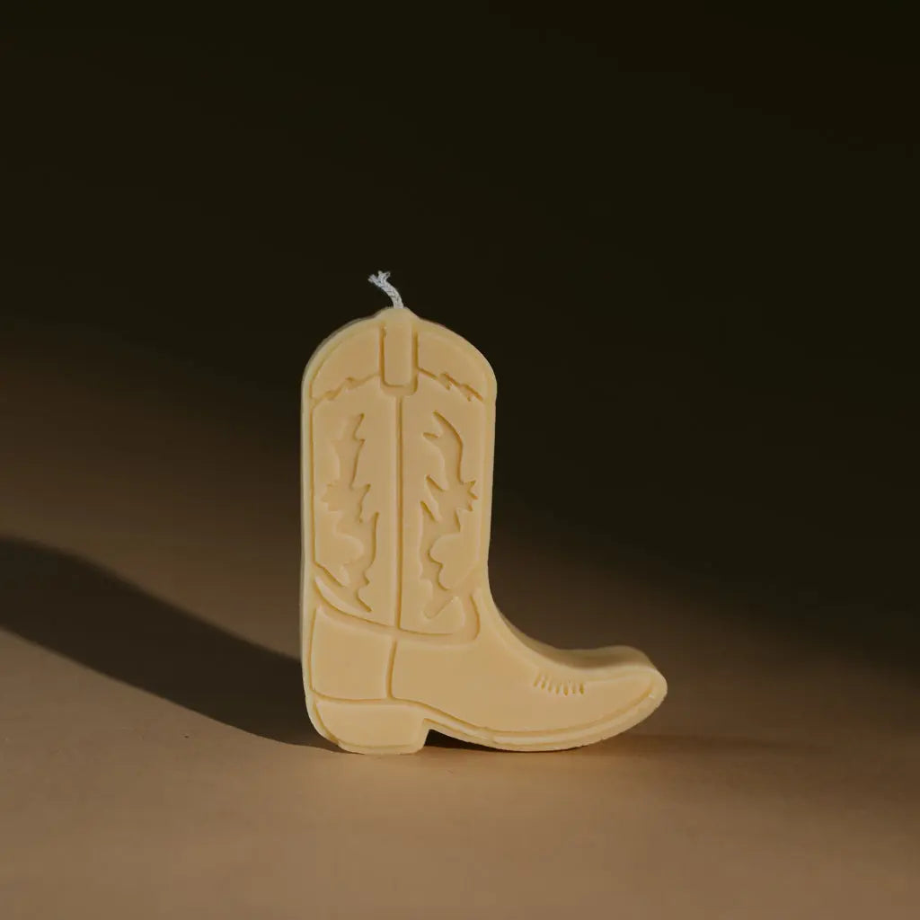 Cowboy boot shape candles by gold + ivy, scented candle detail photo 5