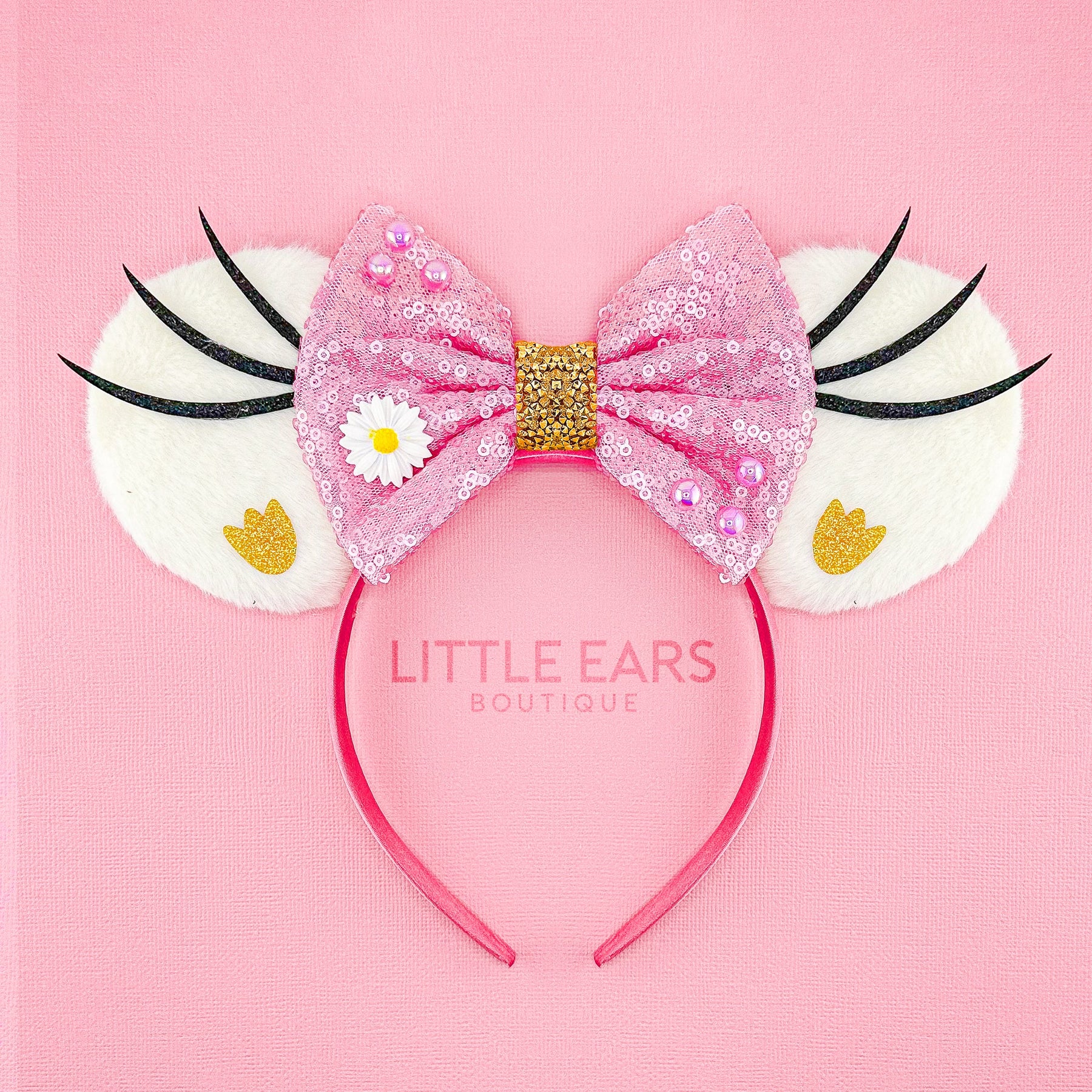 Pretty in Pink Ears by Little Ears Boutique, travel planning service main product photo