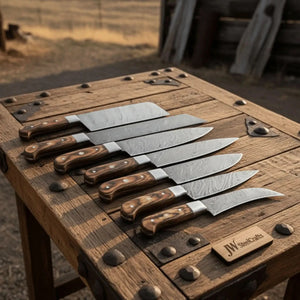 7-Piece Damascus Steel Kitchen Knife Collection with Flowing Water Pattern Blades.