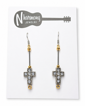 Cross-shaped earrings with rhinestones on a NHarmony Jewelry card.