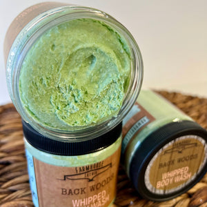 Close up of Farmhouse Lather Back Woods whipped body wash texture with jojoba oil and argan oil