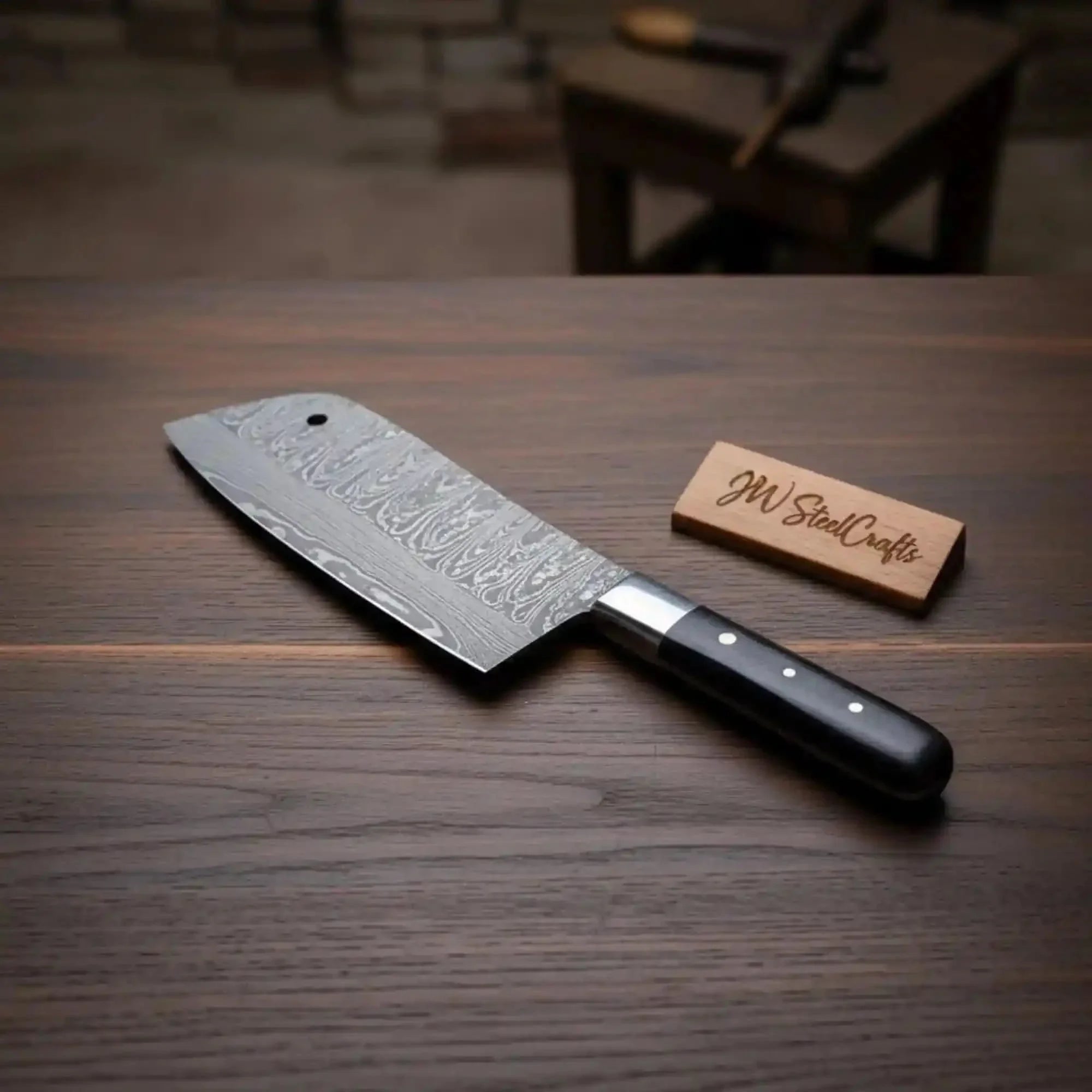 7-Inch Forged Damascus Cleaver Knife — Twisted Pattern Blade, Grey Pakka Wood Handle, Steel Bolster & Hanging Hole | JW Steel Crafts by JW SteelCrafts, Damascus knife detail
