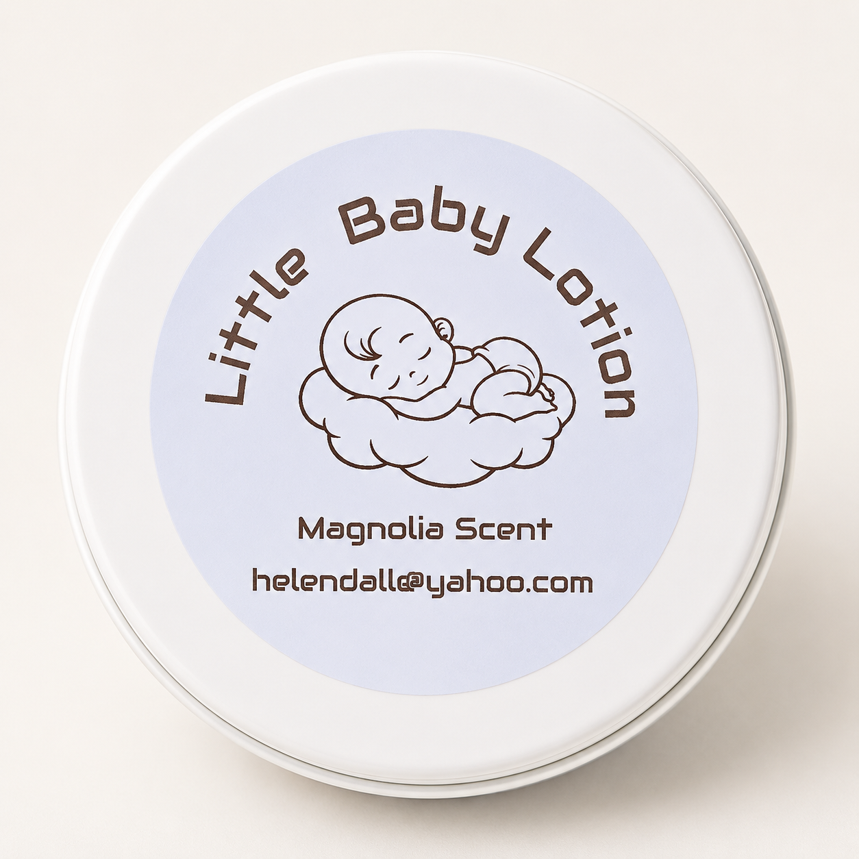 Little Baby Lotion Bars tin lid with Magnolia Scent label and sleeping baby illustration