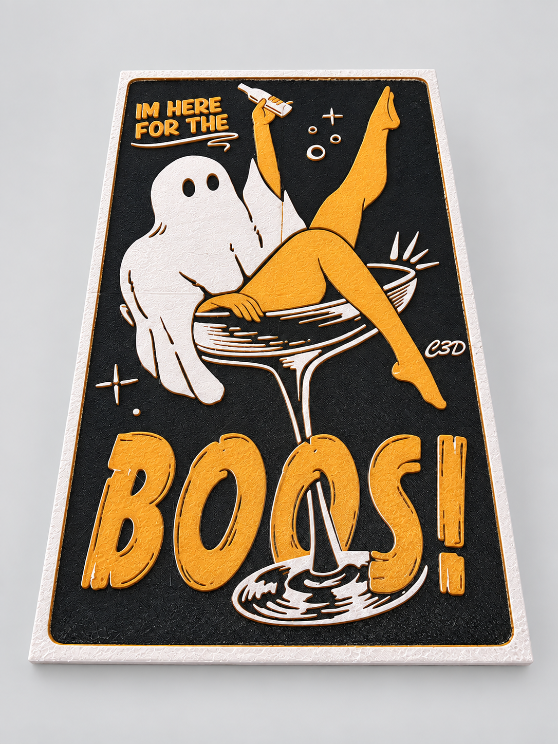 Angled detail showing the raised texture of Here for the Boos Halloween wall art