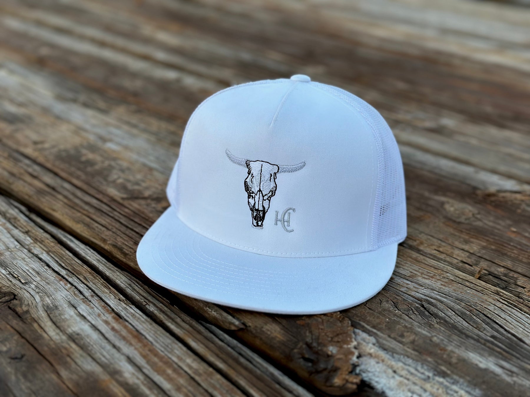 Cow Skull White Flat Bill Hat by High Cotton Hat Co in Texas