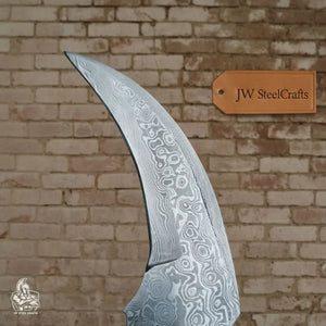 Karambit Knife with Black horn and Stainless steel handle.