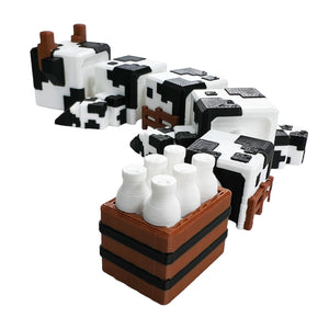 Minecraft-inspired articulated cube cow surprise figure shown with its segmented body and milk crate tail