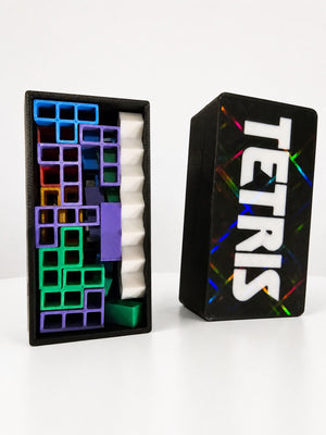 Mini Tetris style travel puzzle game with pieces stored inside the box