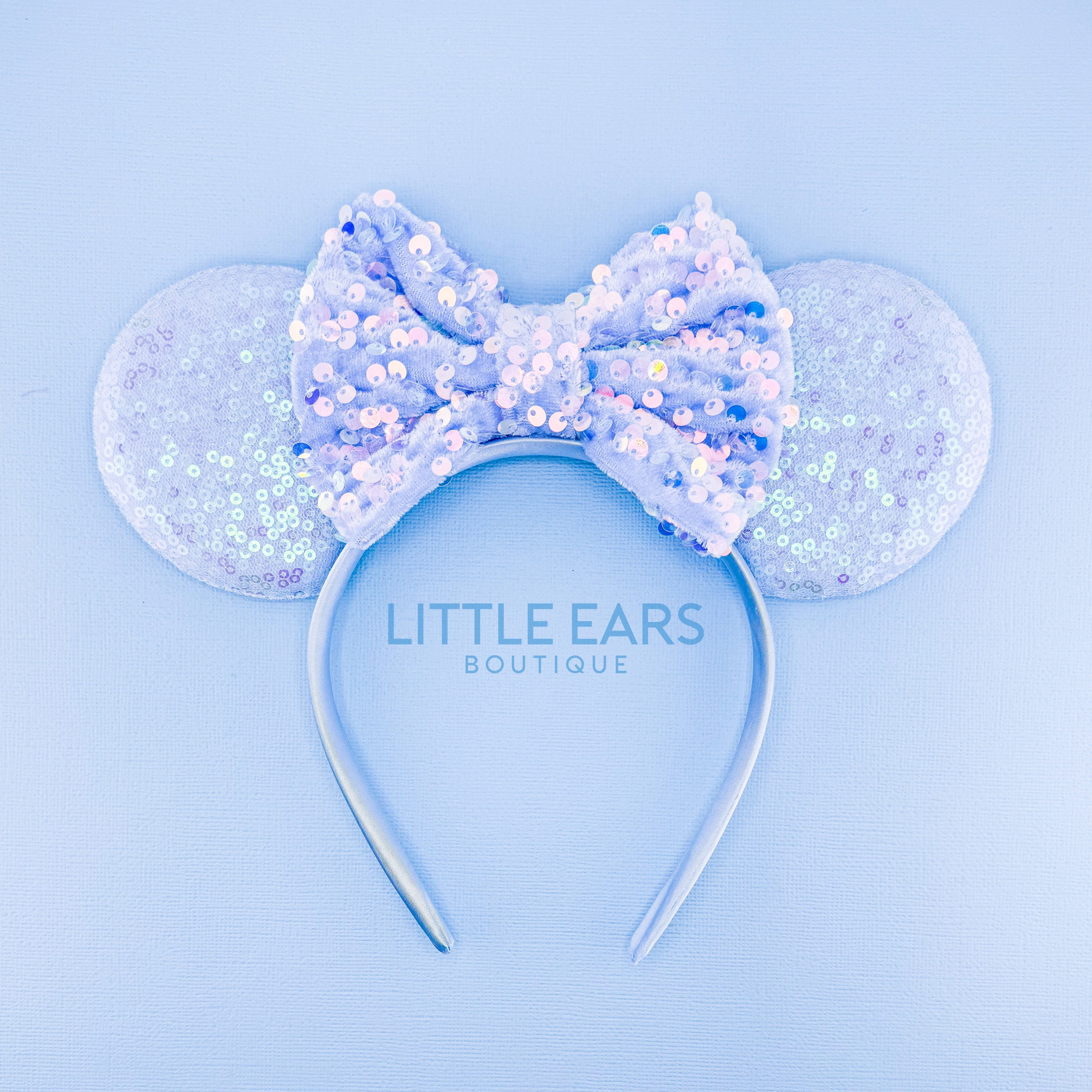 Blue sequin handmade theme park ears by Little Ears Boutique
