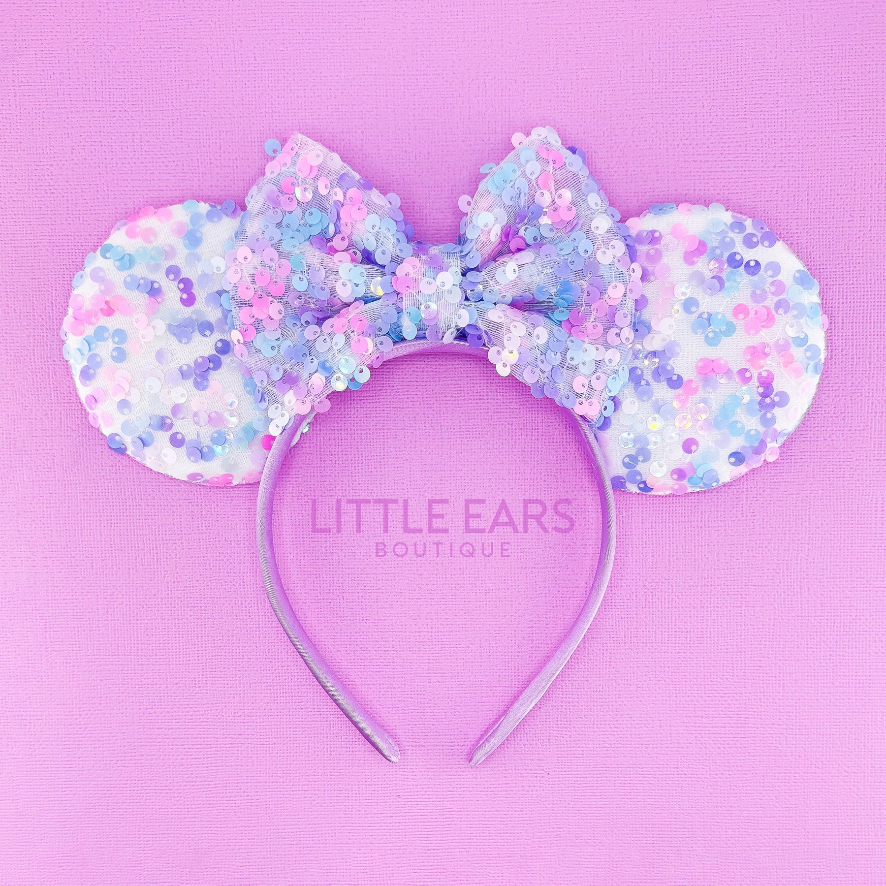 Purple Sequin Ears by Little Ears Boutique, travel planning service main product photo