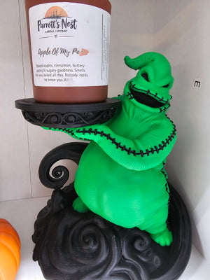 Green Oogie Boogie-inspired Halloween candle holder with black tray