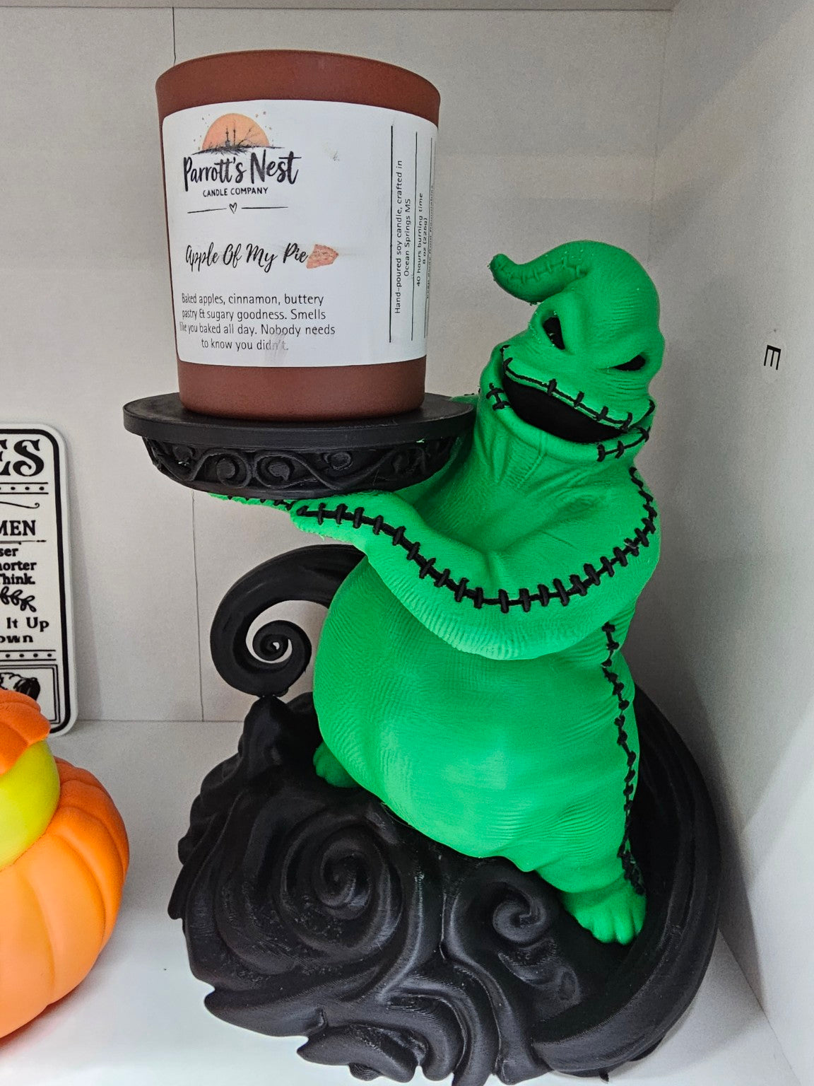 Oogie Boogie-inspired candle holder displayed with a jar candle