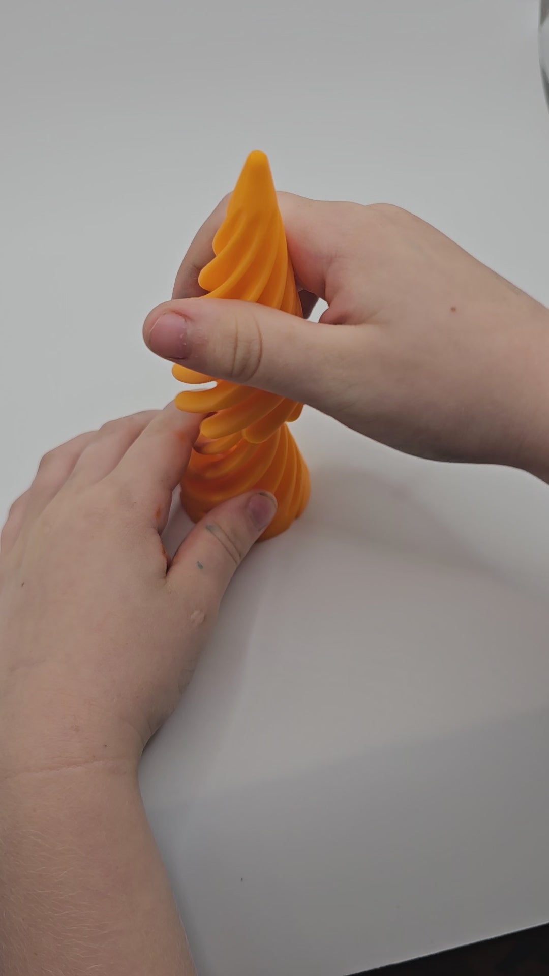 Video of Swirl Cone Fidget held in hand showing spiral design – Mississippi handmade gifts