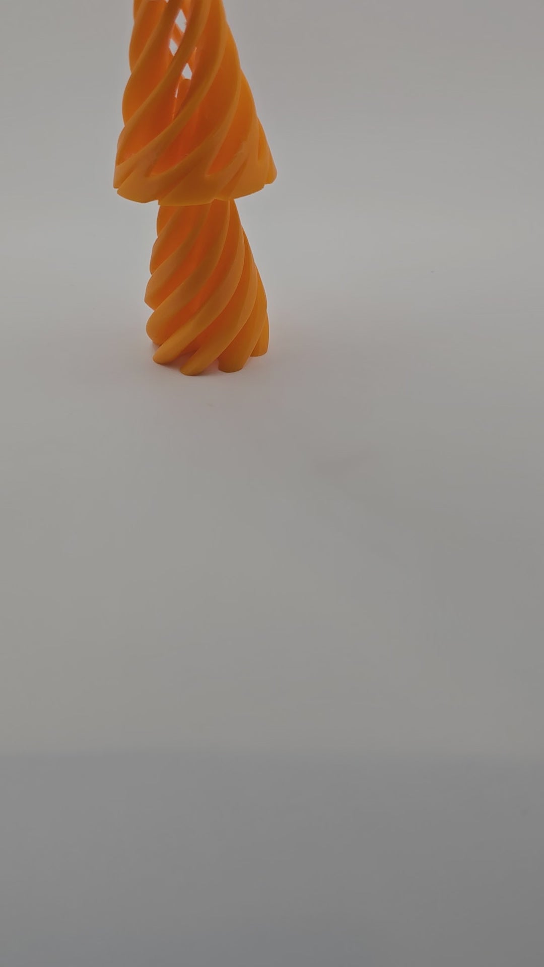 Swirl Cone Fidget held in hand showing spiral design – Mississippi handmade gifts