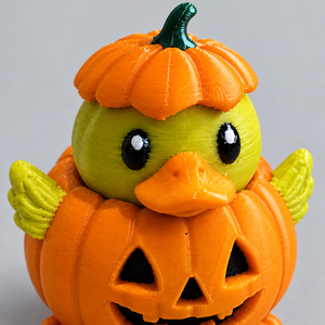 Close-up of Halloween pumpkin duck face, pumpkin cap, and jack-o-lantern body