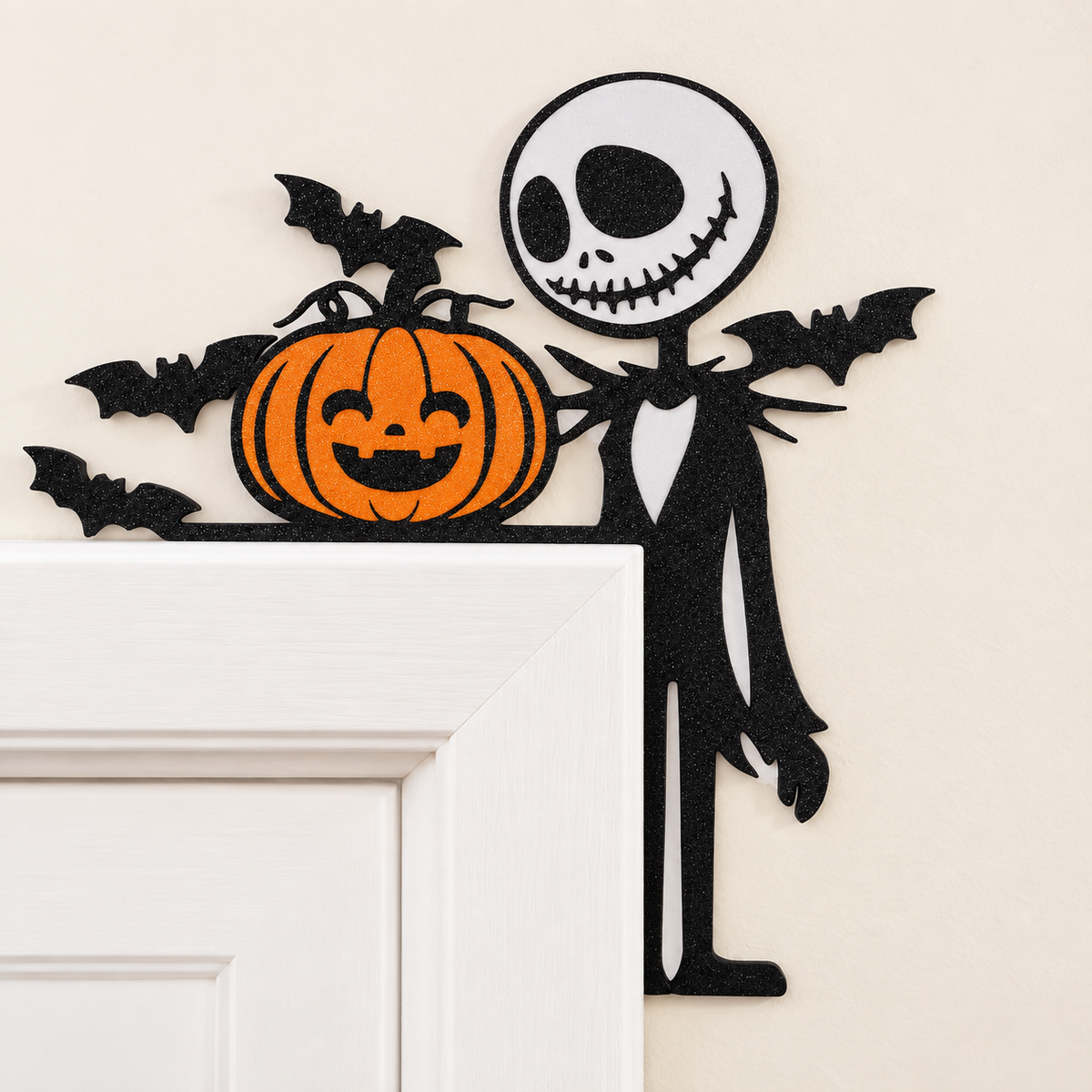 Smiling skeleton and pumpkin Halloween door corner topper close-up