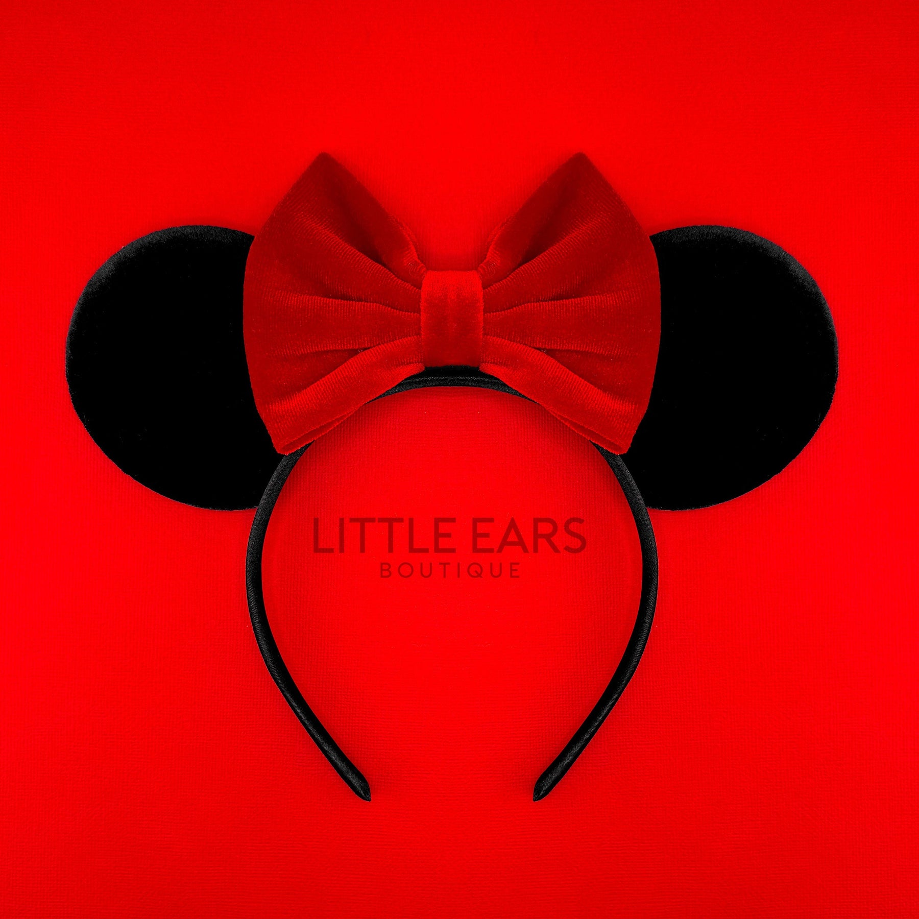 Red Bow & Black Velvet Ears by Little Ears Boutique, travel planning service main product photo