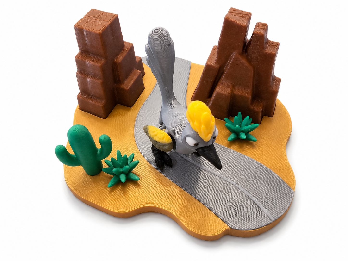 Top view of 3D printed desert roadrunner playset showing winding road, cactus, and canyon rocks