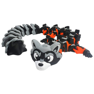 Star Bandit Dragon articulated 3D printed flexi dragon curled with gray and black striped tail and orange body