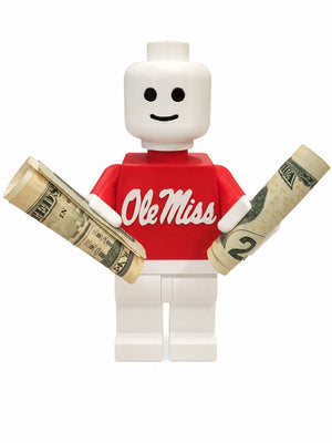 The Tween Space Ole Miss Brickman holding rolled cash for wholesale college gift displays