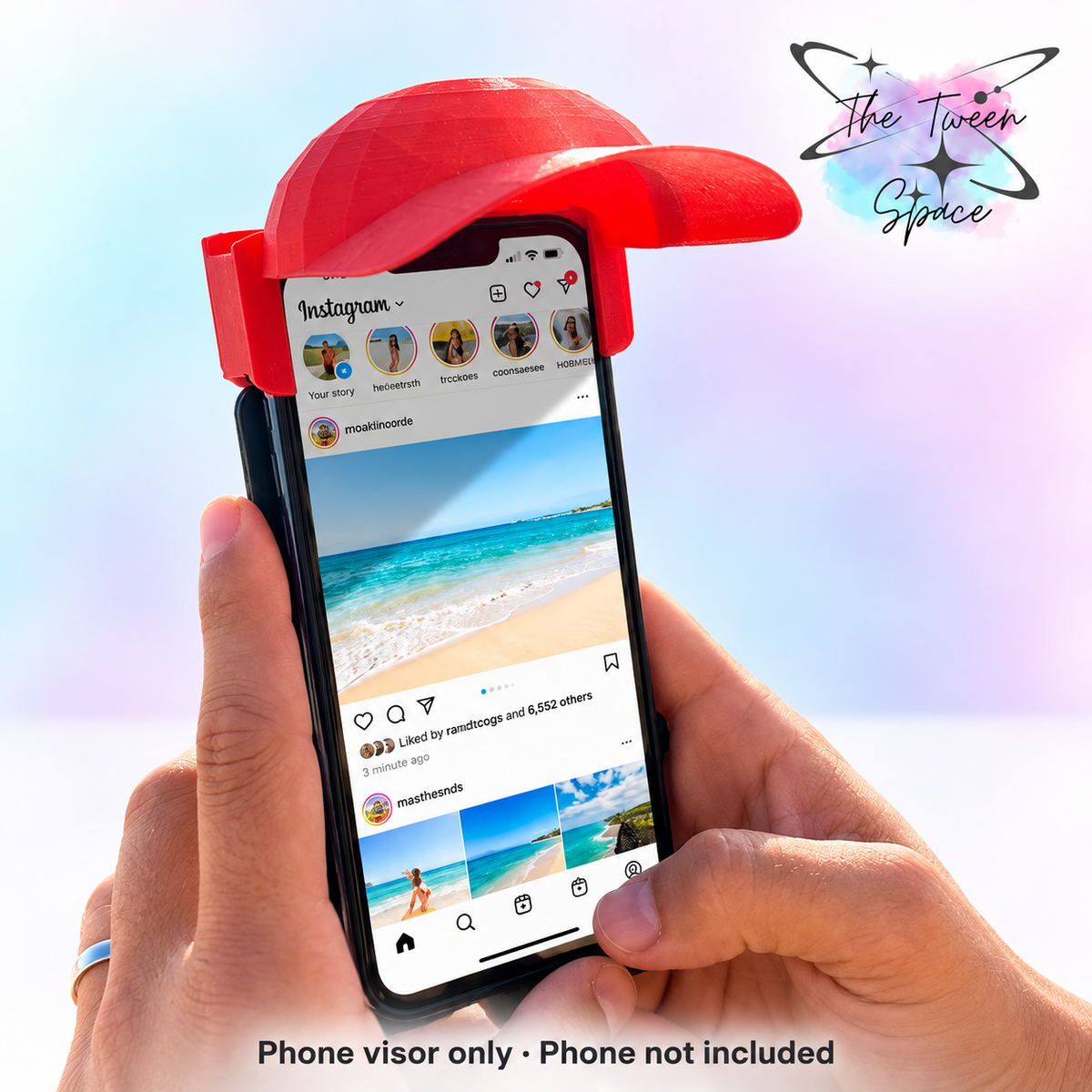 Red baseball-cap-shaped phone sun visor on a phone, with The Tween Space logo; phone not included