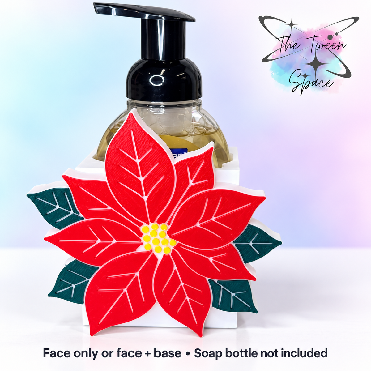 Poinsettia interchangeable face by The Tween Space, shown on a standard base with soap bottle for display; choose face only or face plus base.
