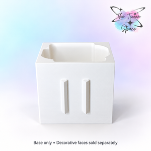 White interchangeable soap holder base; decorative faces sold separately.