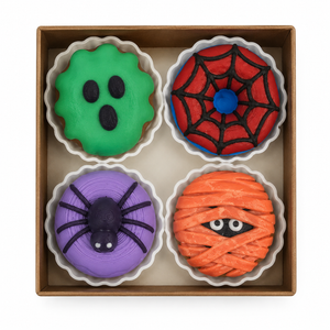 Box of four assorted Halloween donut clicker fidget toys with ghost, spiderweb, spider and mummy designs