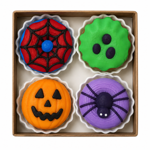 Box of four mini Halloween donut clickers featuring spiderweb, green ghost, pumpkin and spider designs
