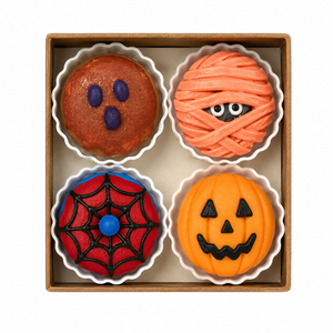 Box of assorted Halloween donut clickers with ghost, mummy, spiderweb and pumpkin designs