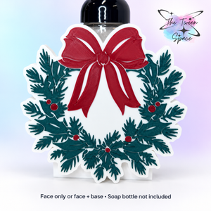 Christmas wreath interchangeable face with red bow; soap bottle not included.