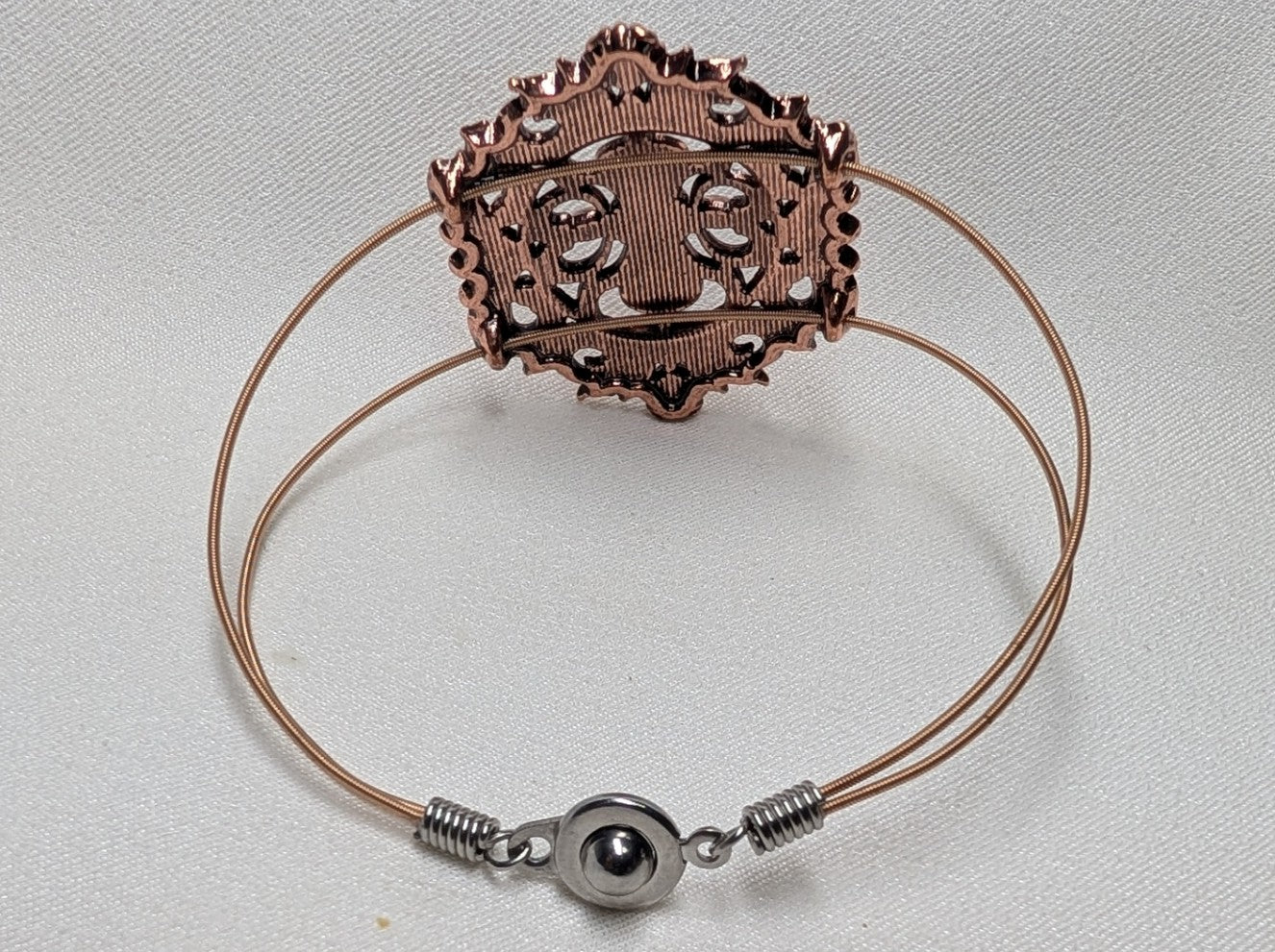 Copper & rhinestone guitar string bracelet